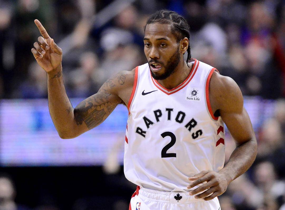 猛龙队稳定发挥,战胜马刺队 猛龙队稳定发挥,战胜马刺队